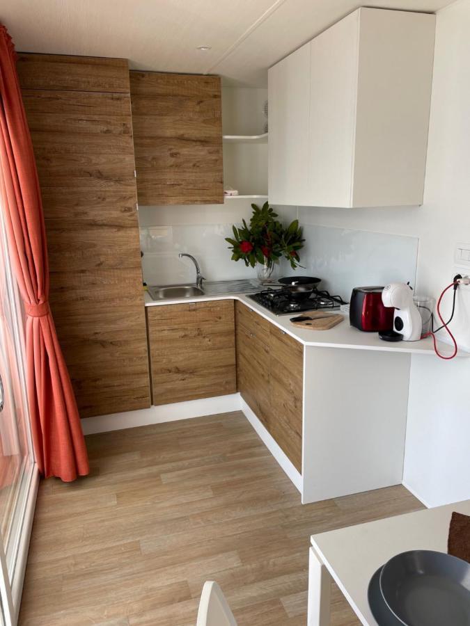 Bungalow Lido Colico Bagian luar foto